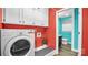 Laundry room with washer, dryer, and additional storage cabinets at 50 Berea Church Quincy Rd, Hiddenite, NC 28636