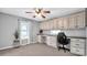 Home office with built-in cabinetry and granite countertop at 50 Berea Church Quincy Rd, Hiddenite, NC 28636