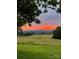 Sunset over distant mountains from property at 50 Berea Church Quincy Rd, Hiddenite, NC 28636