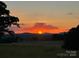 Vibrant sunset view over distant mountains at 50 Berea Church Quincy Rd, Hiddenite, NC 28636