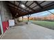 Workshop with covered porch offering scenic views of the surrounding landscape at 50 Berea Church Quincy Rd, Hiddenite, NC 28636
