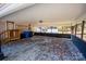 This is a carport featuring a gravel floor and a low dark wall at 5020 Foster Rd, Cleveland, NC 27013