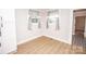 Dining Area featuring a light-filled room with hardwood floors at 5020 Foster Rd, Cleveland, NC 27013