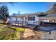 Charming single-story home featuring a covered front porch and convenient carport at 5020 Foster Rd, Cleveland, NC 27013