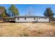 Rear view of house with vinyl siding at 5020 Foster Rd, Cleveland, NC 27013