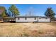 Rear view of a house, showing siding and landscaping at 5020 Foster Rd, Cleveland, NC 27013