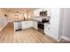 Modern kitchen features stainless steel appliances, granite countertops, and subway tile backsplash at 5020 Foster Rd, Cleveland, NC 27013