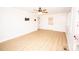 Living room with light walls, hardwood floors, and a ceiling fan at 5020 Foster Rd, Cleveland, NC 27013