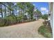 Spacious backyard with private wooded area and mature trees at 55327 Derringer Ave, Fort Mill, SC 29707