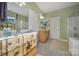 Bathroom boasts double vanity, large shower, and a separate tub at 55327 Derringer Ave, Fort Mill, SC 29707