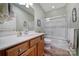 Clean bathroom with single vanity, tub and shower combo at 55327 Derringer Ave, Fort Mill, SC 29707