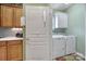 Convenient laundry room with washer and dryer included at 55327 Derringer Ave, Fort Mill, SC 29707