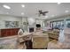 Open living room featuring hardwood floors, fireplace and multiple seating areas at 55327 Derringer Ave, Fort Mill, SC 29707