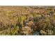 Aerial view showing house among trees and other homes at 612 Harry St, China Grove, NC 28023