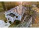 Single story house, gray exterior, in wooded area at 612 Harry St, China Grove, NC 28023