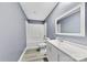 Clean bathroom with white vanity and tub shower at 612 Harry St, China Grove, NC 28023