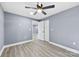 Spacious bedroom with grey walls and hardwood floors at 612 Harry St, China Grove, NC 28023