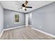 Bedroom with grey walls, hardwood floors, and closet at 612 Harry St, China Grove, NC 28023