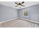 Spacious bedroom with wood-look flooring and ceiling fan at 612 Harry St, China Grove, NC 28023