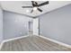 Bedroom with grey walls and hardwood floors at 612 Harry St, China Grove, NC 28023