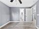 Charming bedroom with wood-look flooring and access to bathroom at 612 Harry St, China Grove, NC 28023