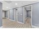 Long hallway with gray walls and wood-look flooring at 612 Harry St, China Grove, NC 28023