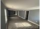 Spacious living room with gray walls and wood flooring at 612 Harry St, China Grove, NC 28023