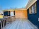 Deck with wood siding and railing at 813 S Zion St, Landis, NC 28088