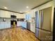 Modern kitchen with stainless steel appliances at 813 S Zion St, Landis, NC 28088
