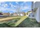 Spacious backyard with a tree and privacy fence at 8436 Dawson Ln, Locust, NC 28097