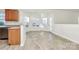 Bright breakfast nook with tile floor and access to backyard at 8436 Dawson Ln, Locust, NC 28097