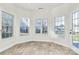 Kitchen nook with hardwood floors and view of backyard at 8436 Dawson Ln, Locust, NC 28097