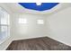 Spacious office with blue coffered ceiling and hardwood floors at 8436 Dawson Ln, Locust, NC 28097