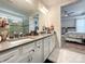 Main bathroom with double vanity and walk-in shower at 9027 Daring Ct, Charlotte, NC 28215