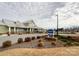 Community clubhouse at Cresswind with landscaping and parking at 9027 Daring Ct, Charlotte, NC 28215