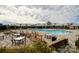 Resort-style pool with plenty of seating for residents at 9027 Daring Ct, Charlotte, NC 28215