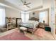 Large main bedroom with a king-size bed and mirrored furniture at 9027 Daring Ct, Charlotte, NC 28215