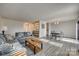 Spacious living room with grey sectional sofa and wood coffee table at 972 Cranberry Cir, Fort Mill, SC 29715