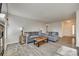 Living room with grey sofas, coffee table and entryway view at 972 Cranberry Cir, Fort Mill, SC 29715