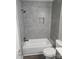 Modern bathroom featuring a large tiled shower and bathtub at 104 Rice St, Kannapolis, NC 28081