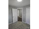 Spacious bedroom with plush carpeting and neutral walls at 104 Rice St, Kannapolis, NC 28081
