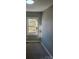 Simple bedroom with gray walls, carpet, and window at 104 Rice St, Kannapolis, NC 28081