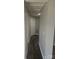 Clean hallway with gray walls and hardwood floors at 104 Rice St, Kannapolis, NC 28081