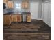 Modern kitchen with wood cabinets, stainless steel appliances, and dark countertops at 104 Rice St, Kannapolis, NC 28081