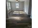 Bright living room with hardwood floors and large windows at 104 Rice St, Kannapolis, NC 28081