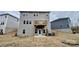 Two story home with a wooden deck overlooking the backyard at 116 Sentinel Ct, Mooresville, NC 28115