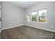 Bright bedroom with three windows and hardwood floors at 117 Chavis Ln, Lincolnton, NC 28092