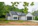 New home boasting white siding, a gray roof, black trim, and a well-maintained lawn at 117 Chavis Ln, Lincolnton, NC 28092