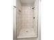 Modern tiled shower with black fixtures offers a luxurious bathing experience at 117 Chavis Ln, Lincolnton, NC 28092