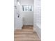 Bathroom featuring a vanity with modern black faucet and subway tiles at 2504 S Cannon Blvd, Kannapolis, NC 28083